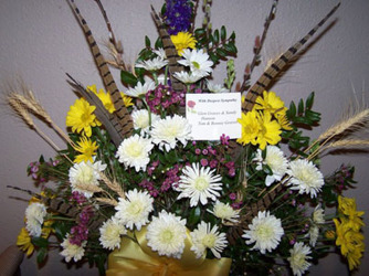 Mixed Blooms with Wheat & Pheasant Feathers from Clark Flower and Gift Shop in Clark, SD