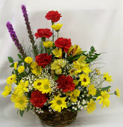 Wicker Basket of Bright Blooms from Clark Flower and Gift Shop in Clark, SD