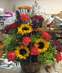 Wicker Basket of Fall Blooms from Clark Flower and Gift Shop in Clark, SD