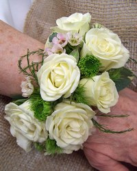 Wrist Corsage Cuff of White Spray Roses from Clark Flower and Gift Shop in Clark, SD