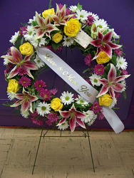 Wreath with Stargazer Lilies from Clark Flower and Gift Shop in Clark, SD