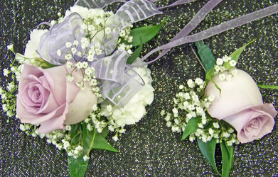 Lavender Rose & White MiniCarnations Wrist Corsage from Clark Flower and Gift Shop in Clark, SD