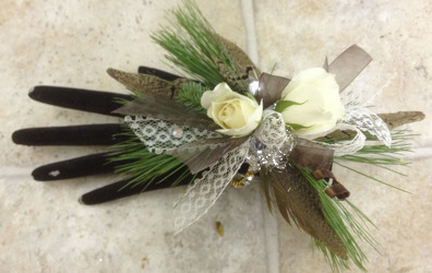 Wrist Corsage of White Spray Roses & Pheasant feathers from Clark Flower and Gift Shop in Clark, SD