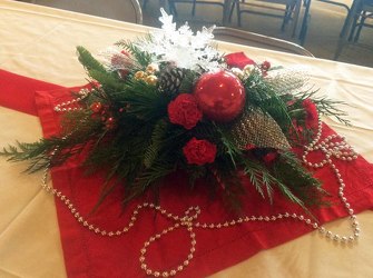 Reception Centerpiece for Christmas Wedding from Clark Flower and Gift Shop in Clark, SD